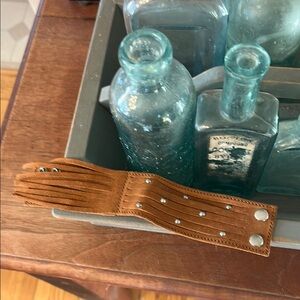 Minnetonka Brown Leather Snap Bracelet with Studs and Fringe